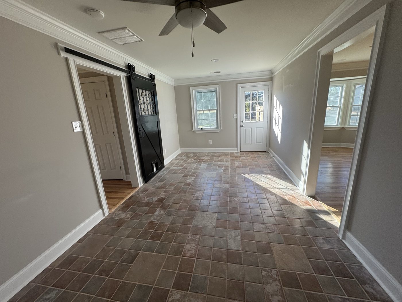Interior barn door and trim installation