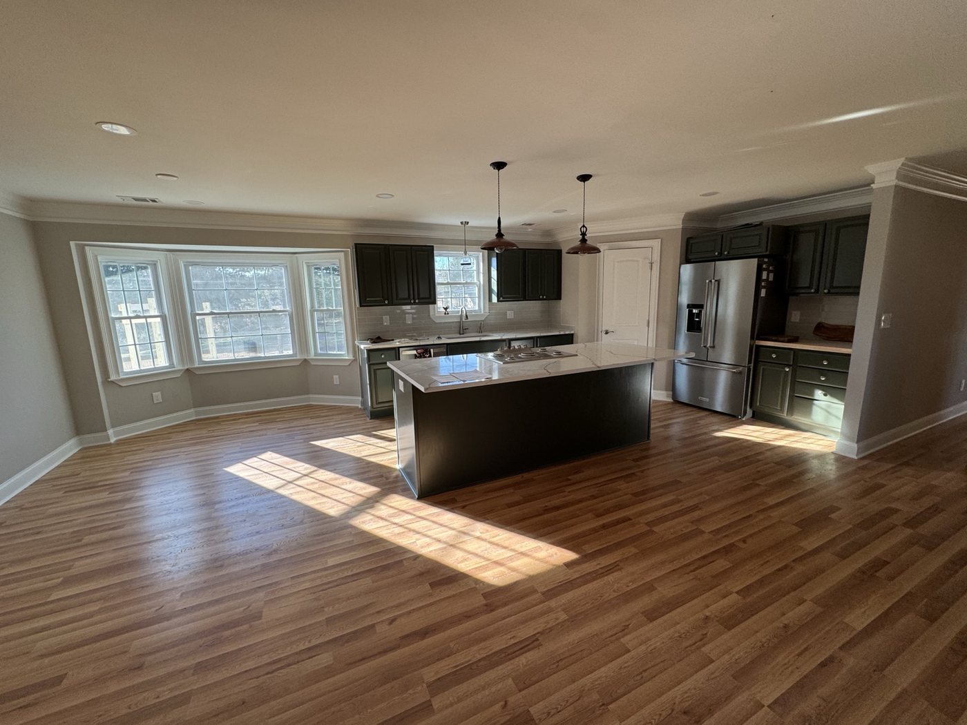 Completed kitchen renovation with island and new finishes