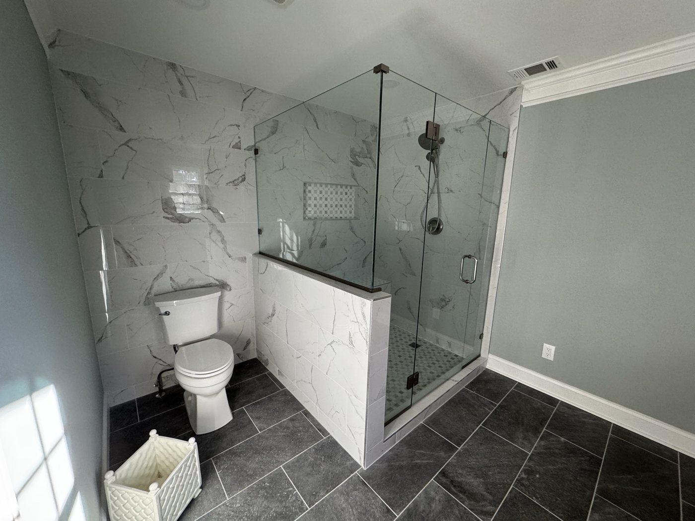 Primary bathroom remodel with glass shower